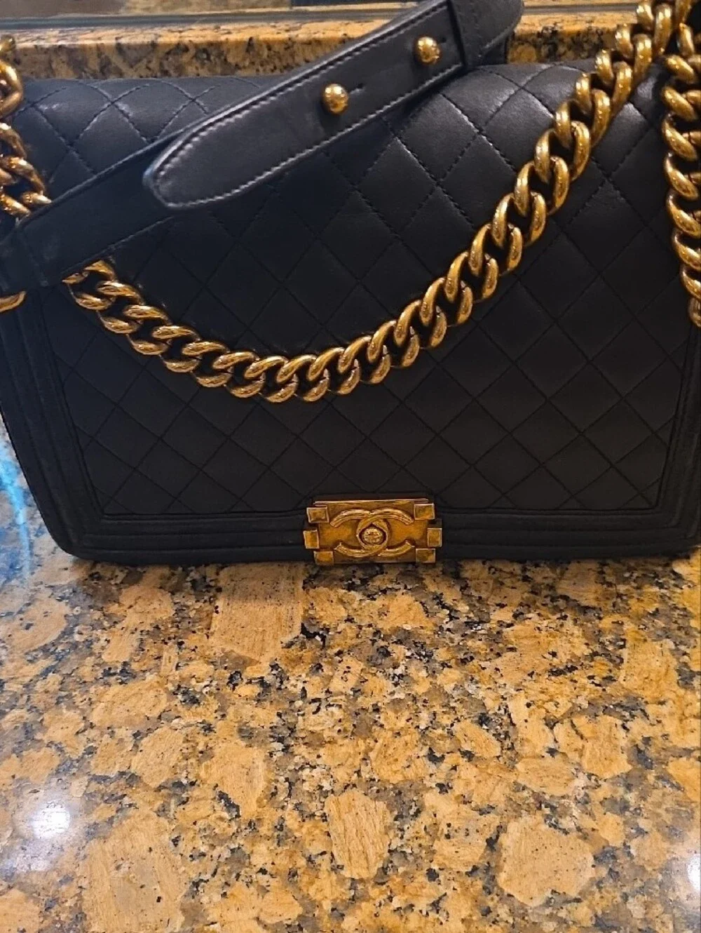 CHANEL Medium Boy Bag Quilted Lambskin Crossbody with Gold Hardware.